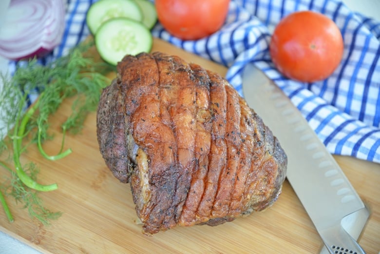 leg of lamb on a cutting board 