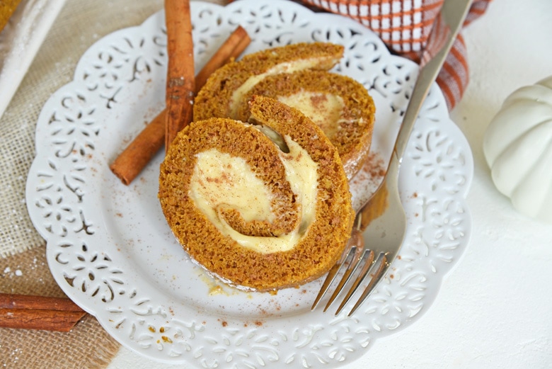 pumpkin cake roll slices on a plate 