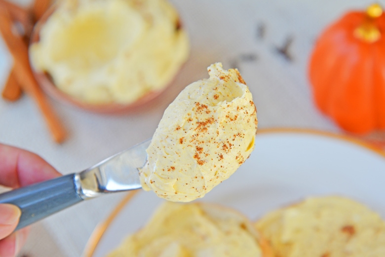 pumpkin spice cream cheese on a serving knife 