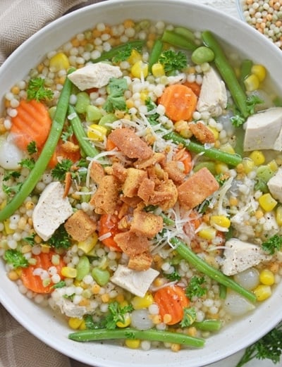 overhead bowl of turkey noodle soup with veggie