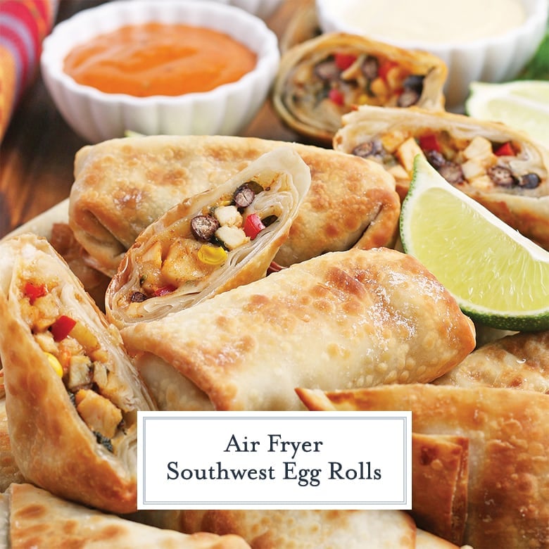 close up of southwest egg rolls with lime wedges 