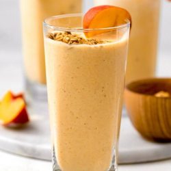 straight on shot of banana peach smoothie