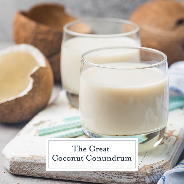 glasses of coconut milk with whole coconuts 