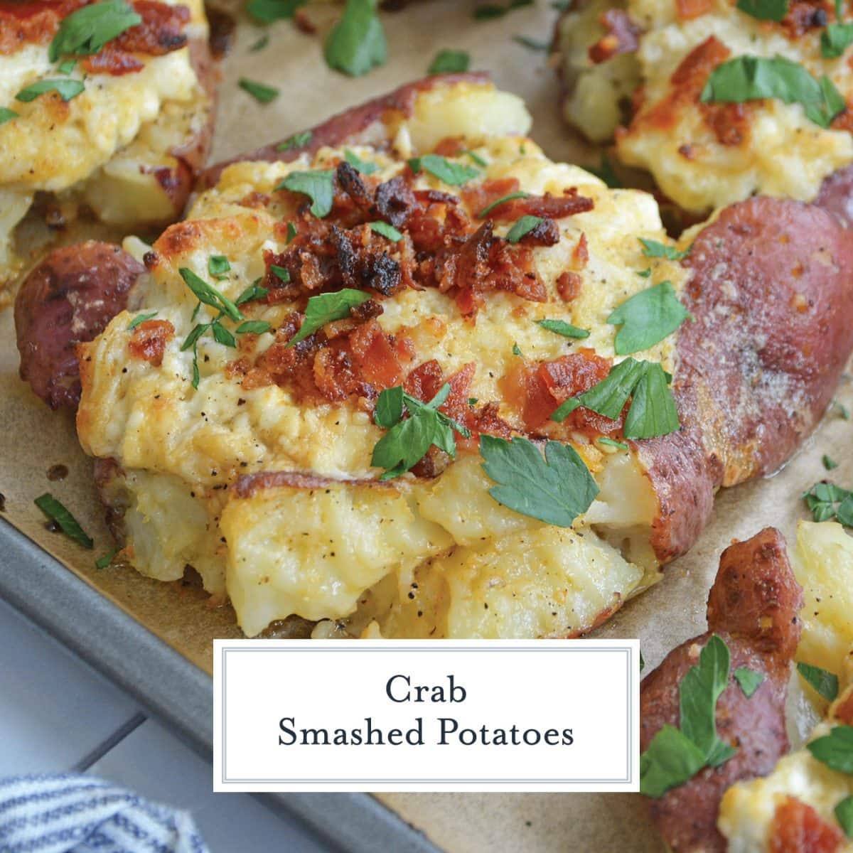 close up of crab topped smashed potato with bacon
