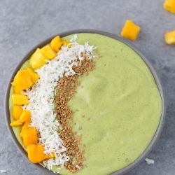 overhead shot of mango coconut smoothie bowl