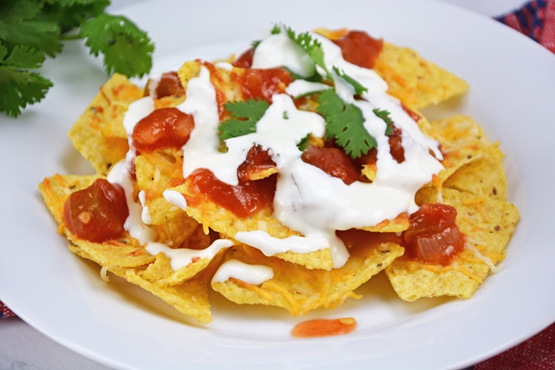 Mexican crema on top of nachos 