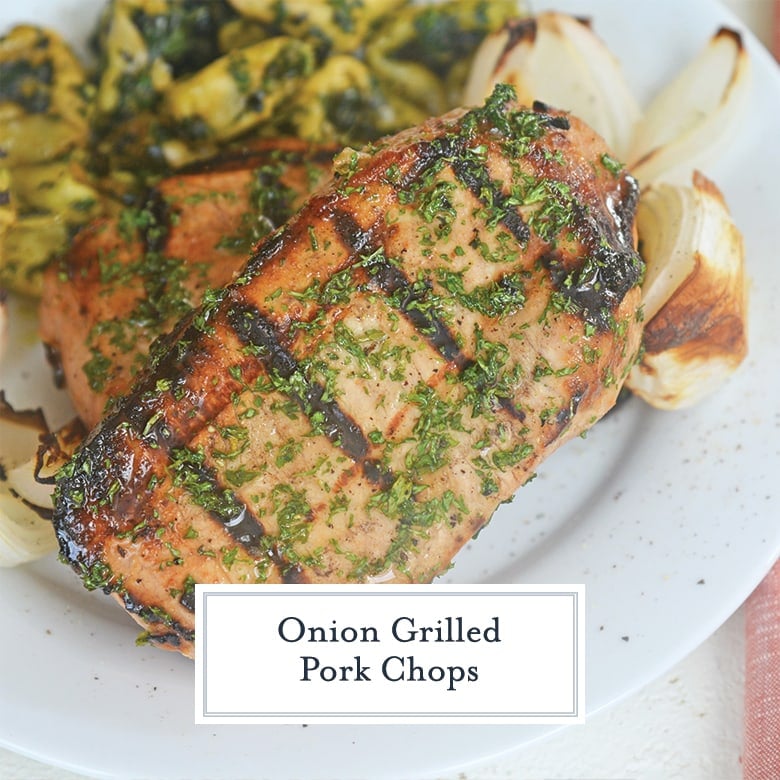 thick pork chop with grill marks and parsley 