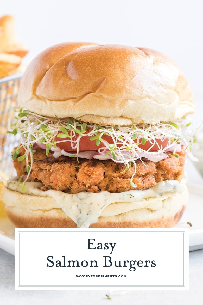 straight on shot of salmon burger with text overlay for pinterest