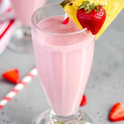 strawberry pineapple smoothie in glass