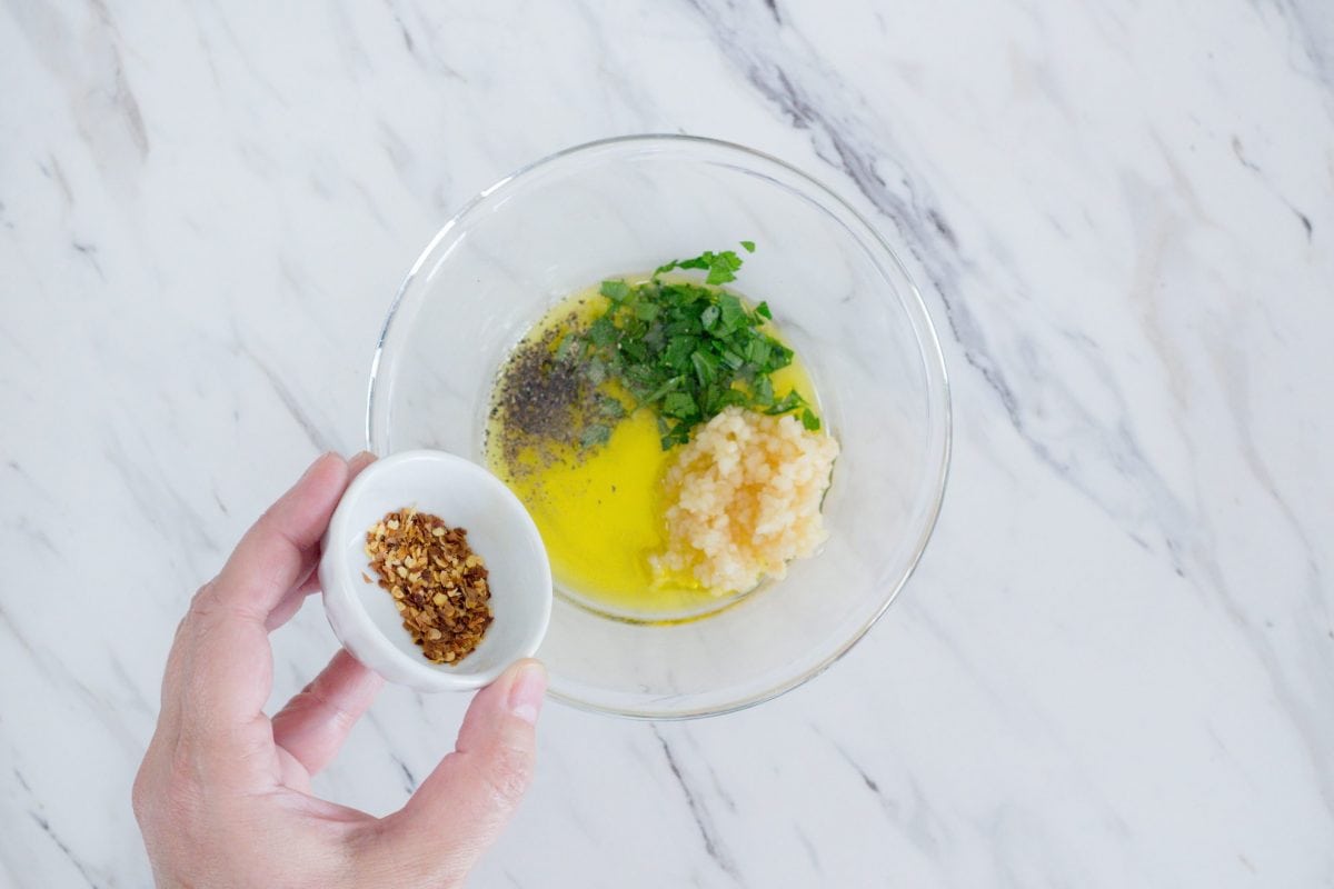 garlic parmesan chicken wing sauce in a glass bowl 