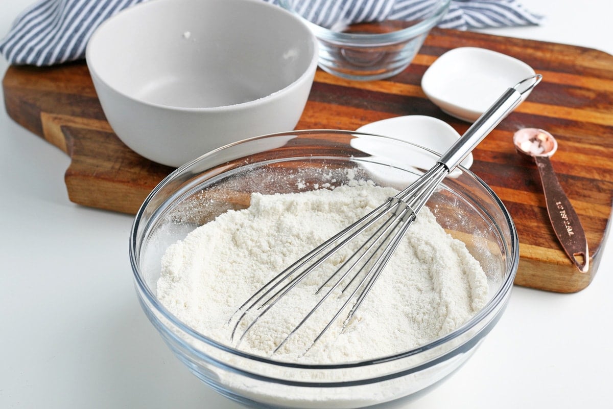 dry cake ingredients in a mixing bowl 