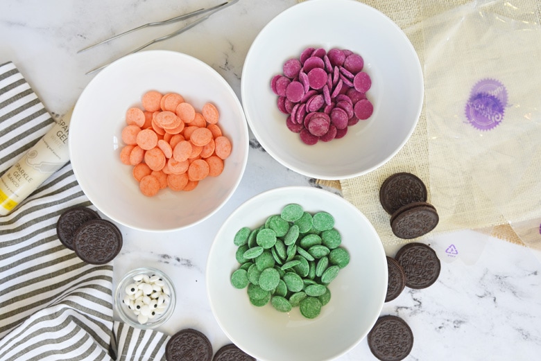 bowls of colored melting chocolate 