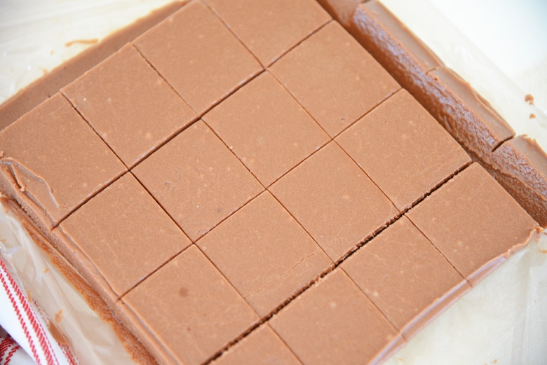 cut squares of fudge in a baking pan 