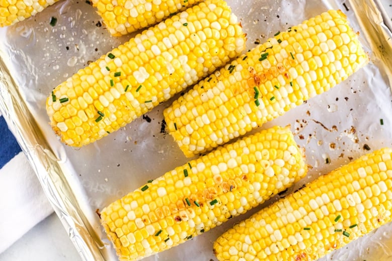 close up of staggered corn on a lined baking sheet 