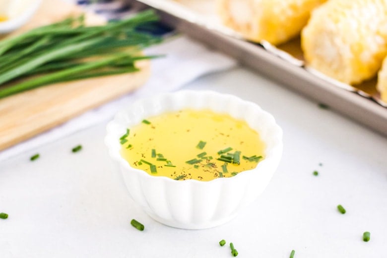 chive butter on a small white bowl 