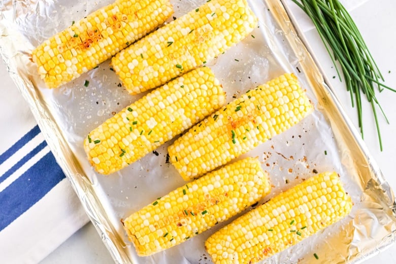 overhead of corn on the cob roasting 