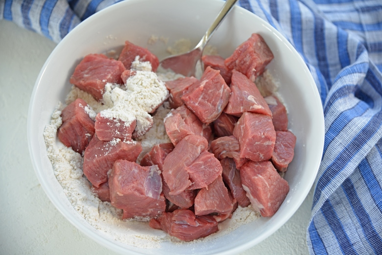 raw beef cubes tossed in seasoned flour