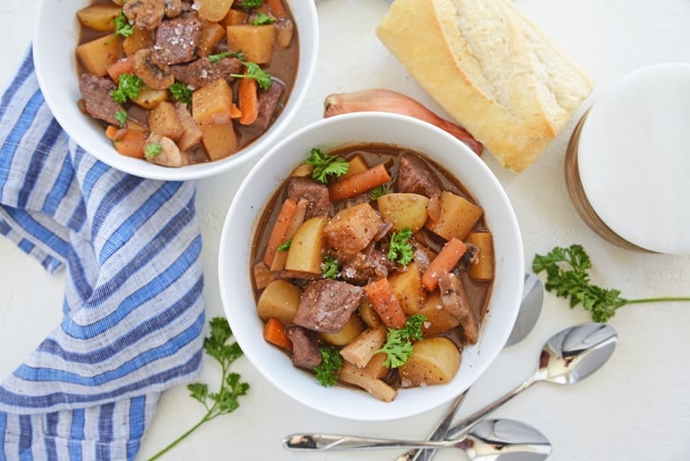 overhead of beef stew bowls