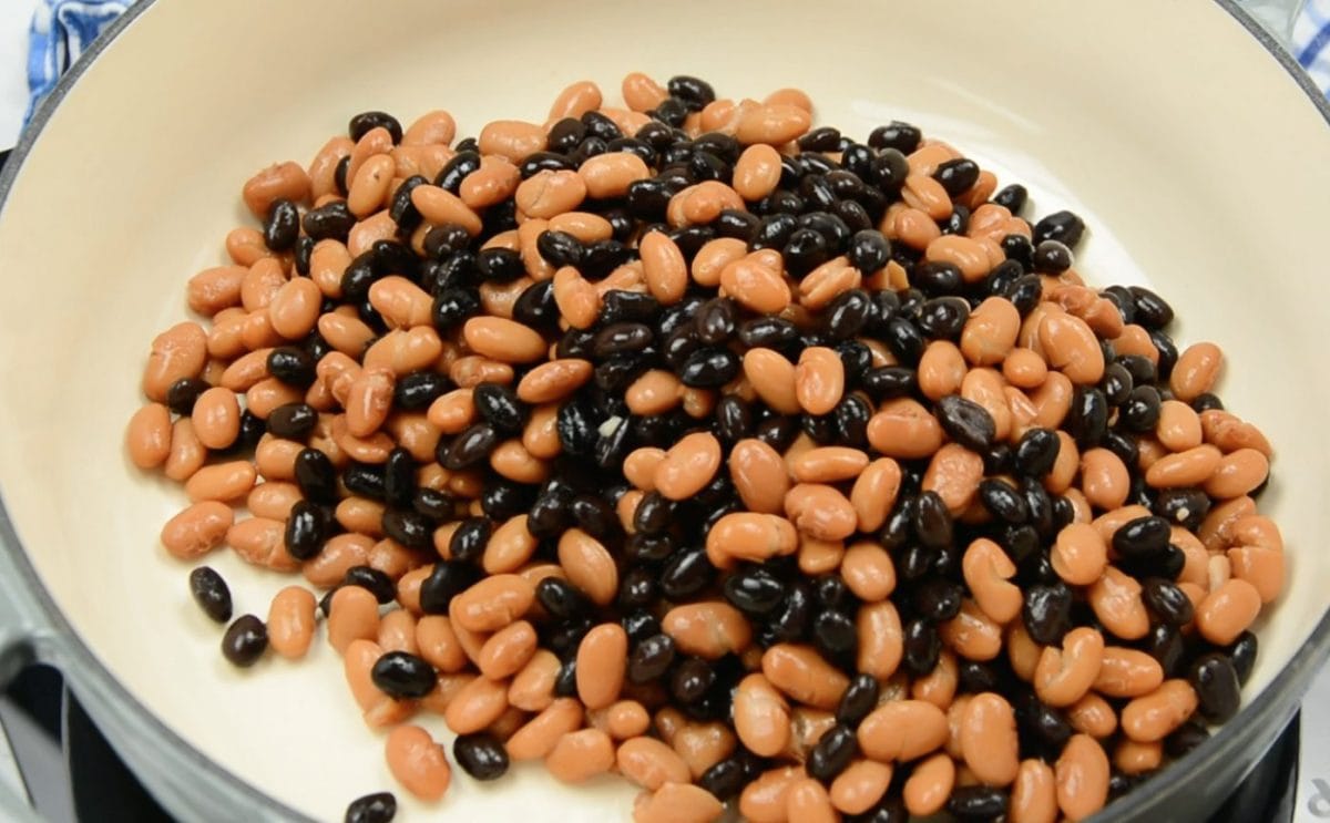 pinto and black beans in a skillet 