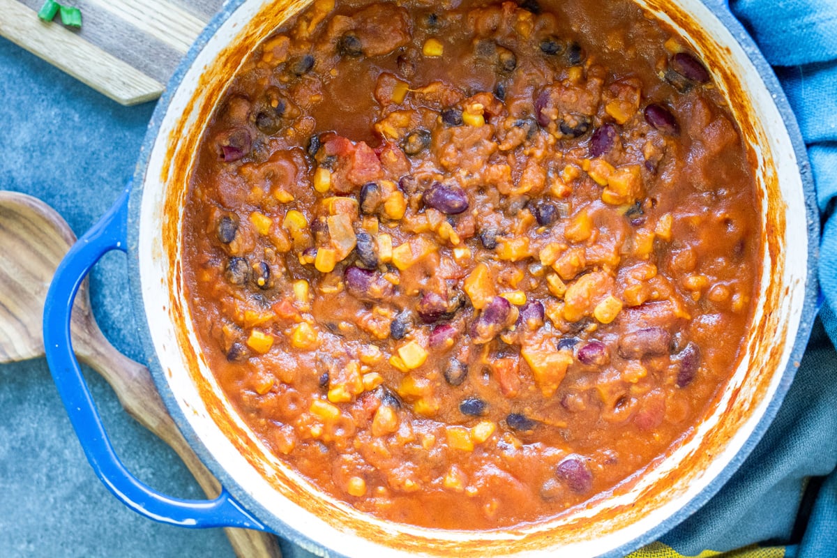 overhead of chili in a dutch oven  