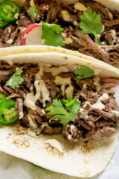 close up of barbacoa tacos