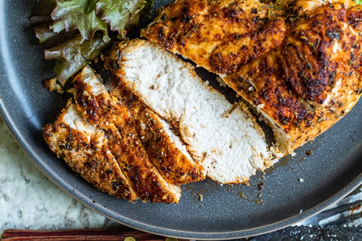 overhead close up shot of sliced blackened chicken