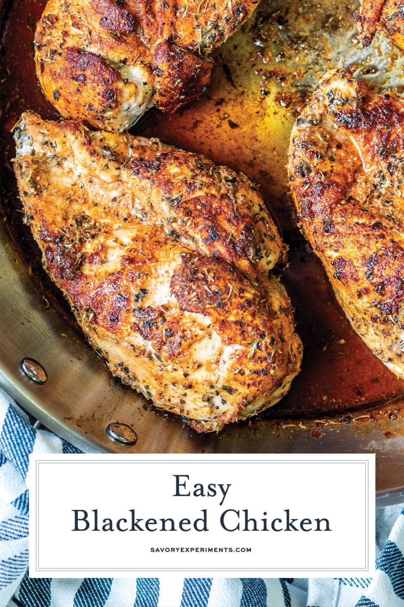 close up of blackened chicken in a frying pan 