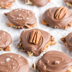 chocolate pecan candy on parchment