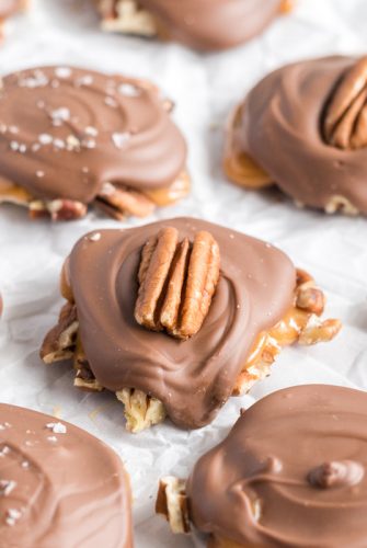 chocolate pecan candy on parchment