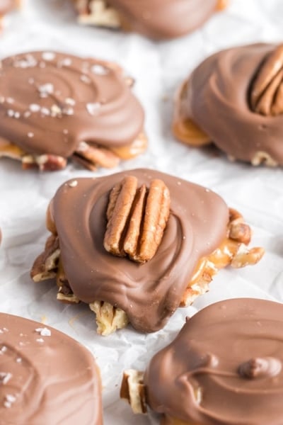 chocolate pecan candy on parchment