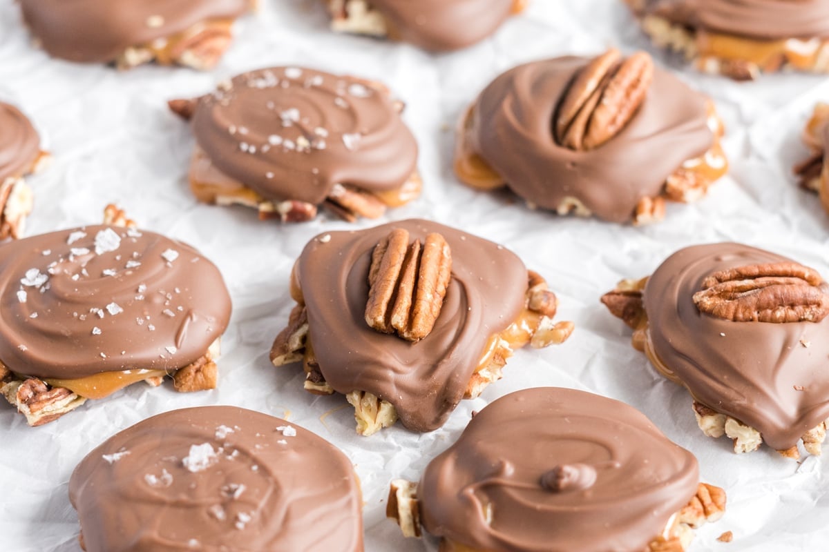 chocolate pecan candy on parchment