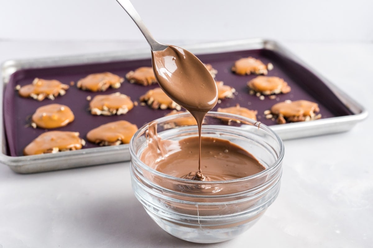 melted chocolate in a bowl on a spoon