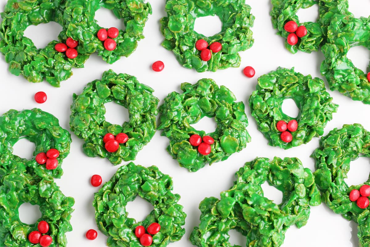 overhead of christmas wreath cookies on parchment 