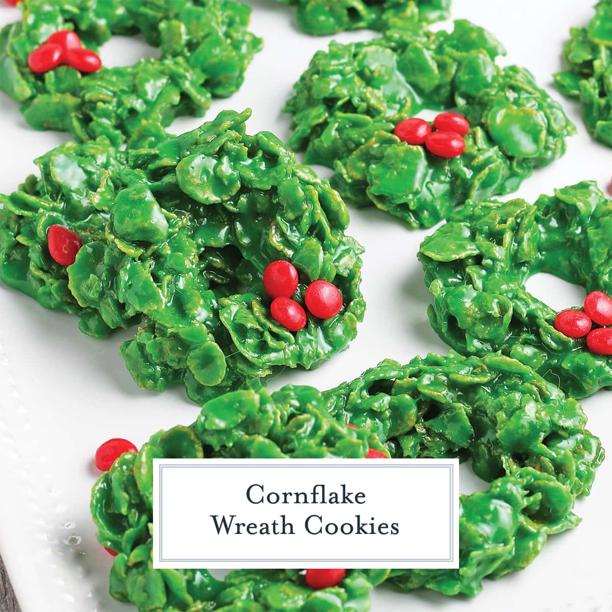 close up of green cornflake wreath with cinnamon candy berries 