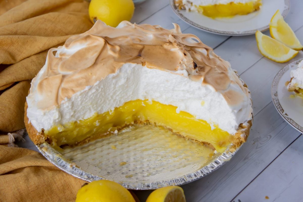 A classic Lemon Meringue Pie is something everyone needs in their recipe box! Check out all of my favorite tips & tricks for the best pie! #lemonmeringuepie #classiclemonmeringuepie www.savoryexperiments.com