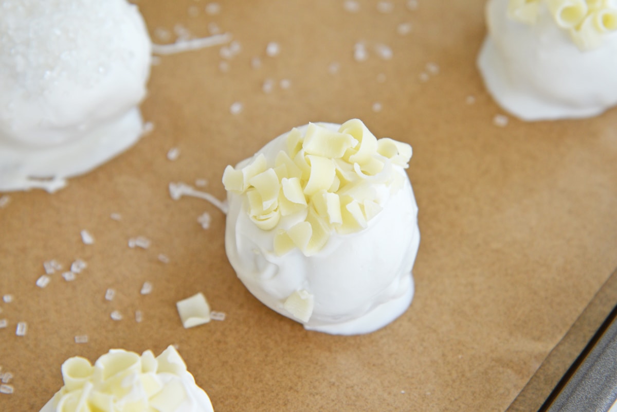 oreo cookie ball decorated with white chocolate curls  