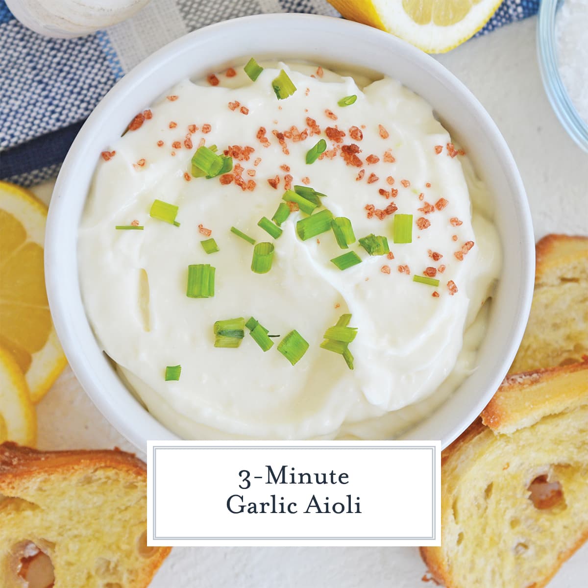 overhead bowl of garlic aioli with chives and red sea salt 