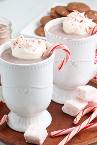 two white mugs of hot chocolate