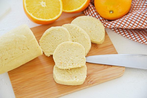slicing cookie dough into discs