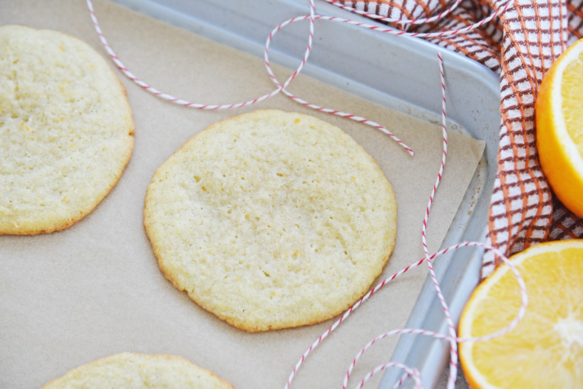 baked cookie on a cookie sheet with red twine 