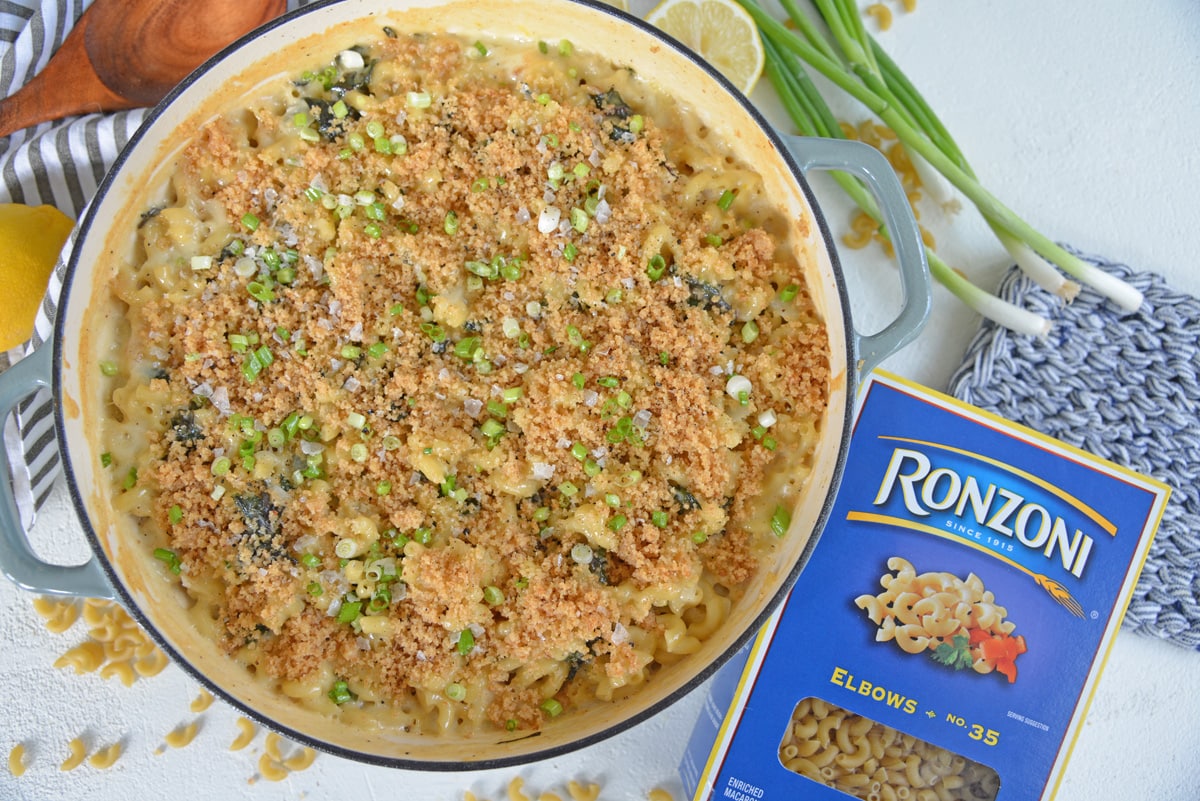 overhead of mac and cheese in a casserole dish with pasta box 