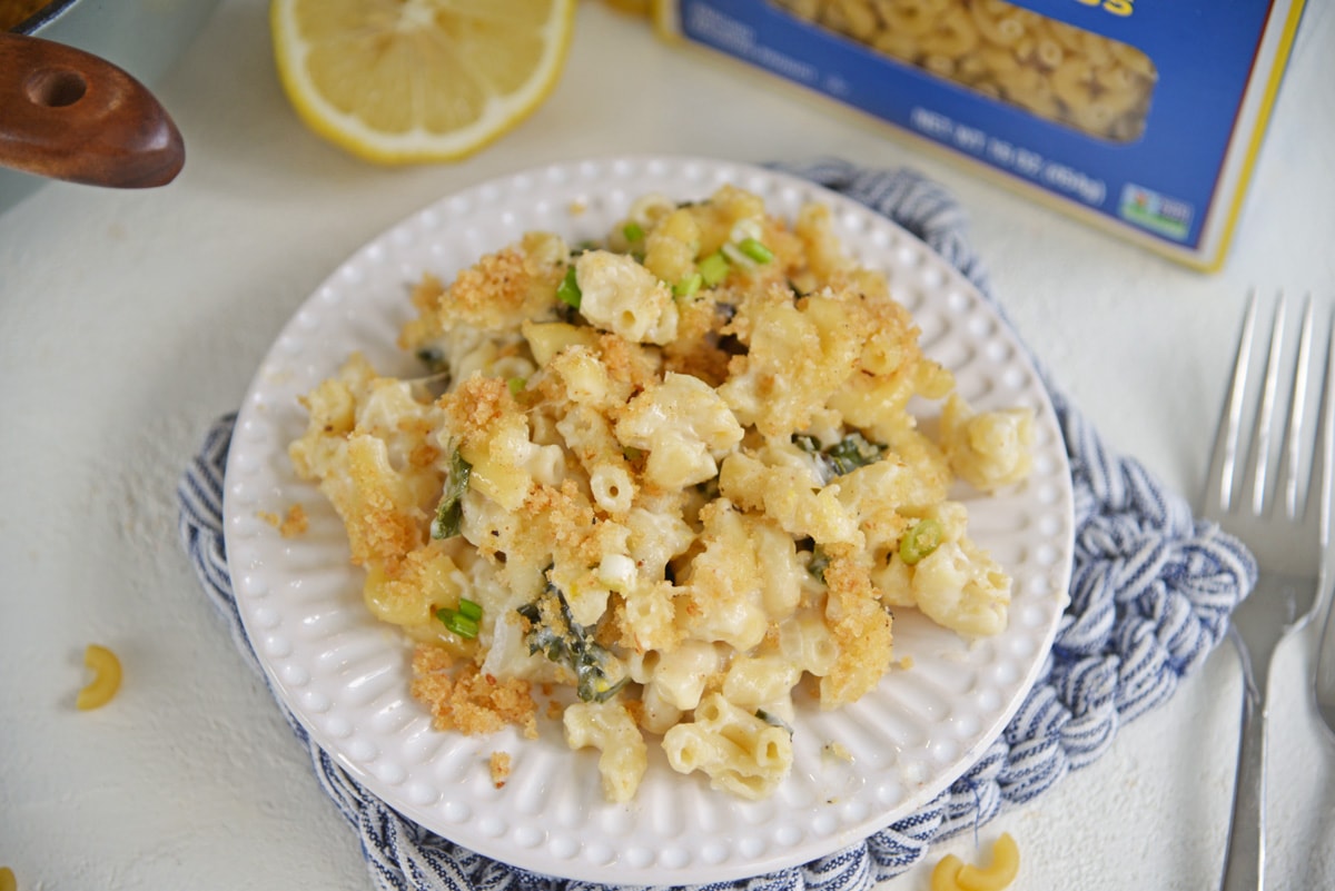 small white serving plate with mac and cheese 