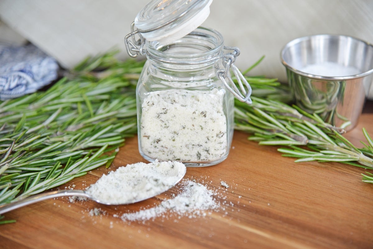 rosemary salt on a wood cutting board 