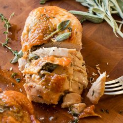 sliced turkey breast on a cutting board