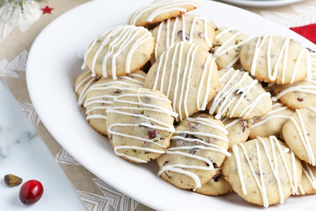 iced cookies on a white platter 