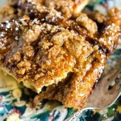 overhead shot of slice of eggnog french toast casserole on plate