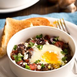 baked eggs and lamb in a bowl