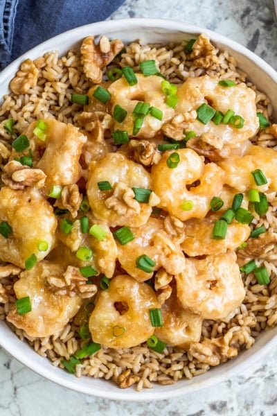 overhead of honey walnut shrimp with rice