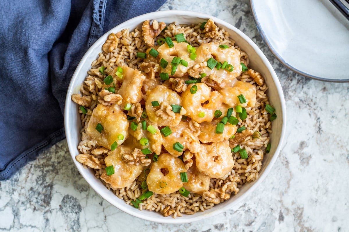 overhead of honey walnut shrimp with rice