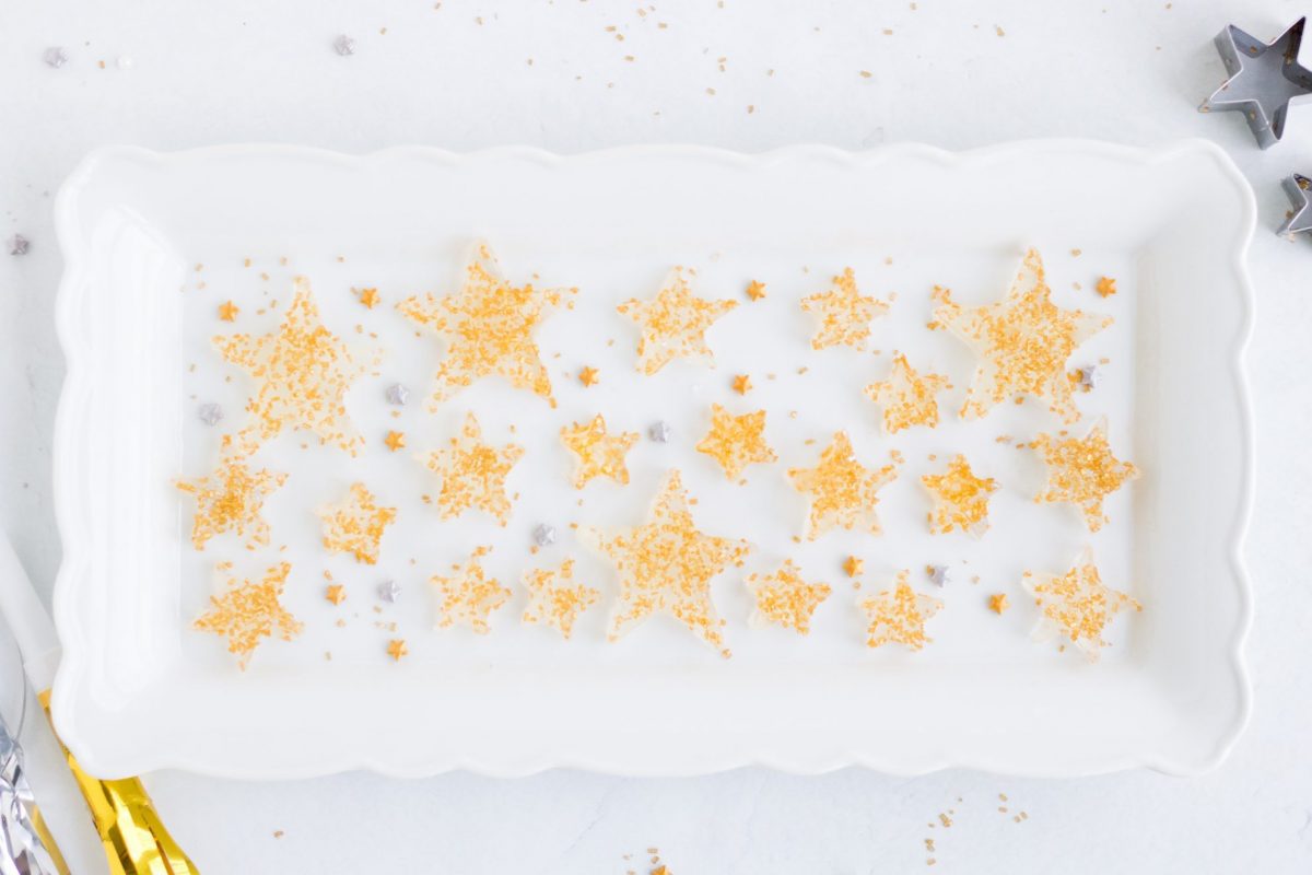 tray of jello jigglers with gold sprinkles 